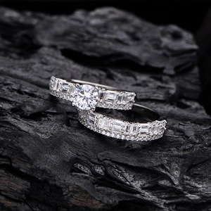 Elegant 925 sterling silver bridal ring set featuring a 6mm round cut sparkling center stone