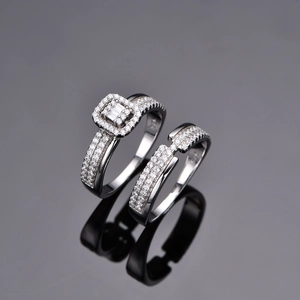 Elegant S925 sterling silver halo ring set with rectangular cut center stone and pavé accents