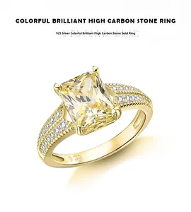 Macro shot of 925 sterling silver stamp on golden ring with yellow gemstone