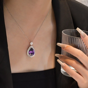 Elegant 925 silver necklace featuring a pear-shaped purple gemstone pendant for women