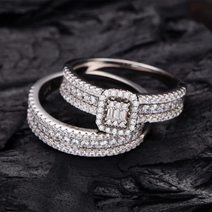 Exquisite S925 silver halo ring set with cubic zirconia on a textured charcoal background