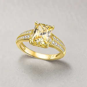 Macro detail of S925 hallmark on the golden radiant cut yellow gemstone ring band