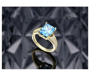 Macro detail of S925 hallmark on 14k gold plated ring with ice cut yellow diamond