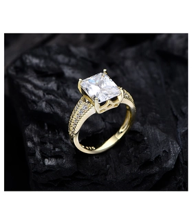 Macro detail of S925 sterling silver stamp and yellow radiant cut sparkling gemstone