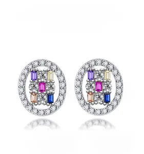 Macro detail of S925 silver stud earrings with oval-shaped colored high carbon diamonds