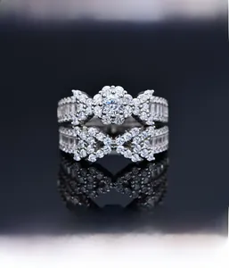 Macro detail of microscopic micro-pave setting process on sterling silver ring set