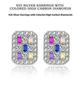 Macro shot of 925 silver stud earrings featuring colorful rectangular cubic zirconia stones