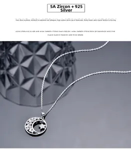 Macro shot of 925 silver star and moon pendant necklace with sparkling 5A cubic zirconia