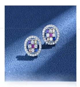 Detail showing oval colorful gemstone earrings with micro-paved silver-plated setting