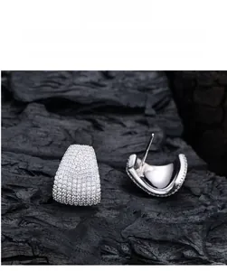 Detailed view of S925 sterling silver stud earrings with pave-set 5A cubic zirconia stones
