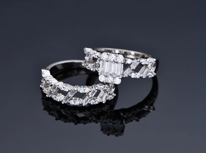 Macro shot of two-piece S925 silver ring set with rectangular zircon and pave setting