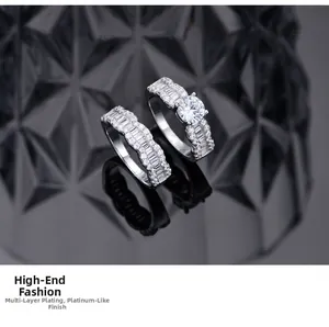 Detail of S925 silver wave ring set with round and baguette zircon on black background