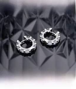 Macro detail of S925 sterling silver hoop earrings with micro-pave setting diamonds