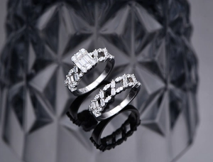 Macro shot of S925 silver stacked ring set with rectangular cubic zirconia in geometric design