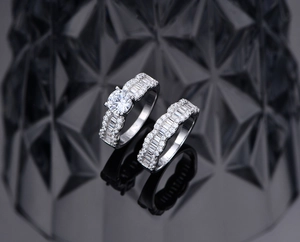 Macro detail of wave-textured S925 silver ring set with round brilliant cubic zirconia