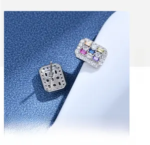 Macro detail of rectangle rainbow zircon stud earrings in 925 sterling silver