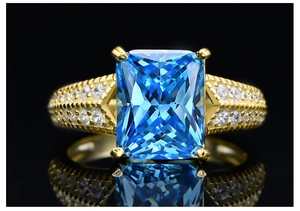 Macro shot of 5.6ct ice-cut blue carbon diamond ring with 14k gold plated S925 silver band