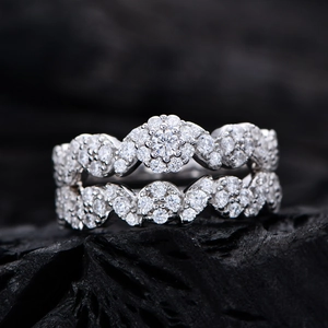 Micro shot of S925 silver micro-pave floral ring set featuring a brilliant round cut stone