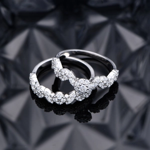 Luxurious S925 silver micro-paved flower ring set with brilliant zircons on a black surface