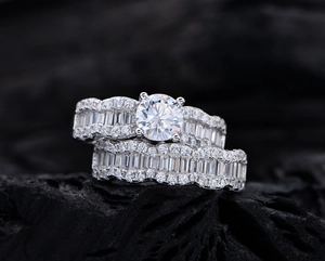 Macro shot of S925 silver wave rings set with brilliant cubic zirconia and baguette diamonds