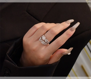 Close-up of S925 silver snowflake ring set with cubic zirconia on a model's hand