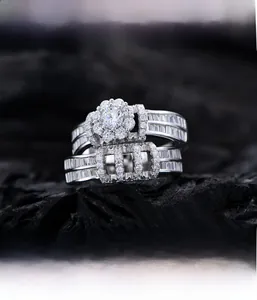 Detailed macro view of S925 silver wedding ring set with micro-pave flower cluster diamonds