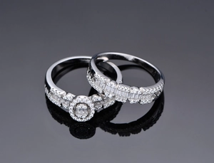 Macro shot of silver S925 oval zircon interlocking ring set with micro-pave stones