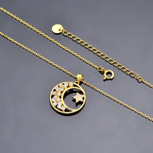 Polished S925 sterling silver moon and star necklace with zircon insets on mirror background