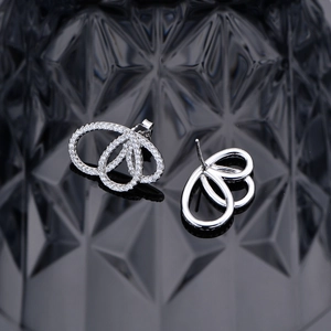 Boucles d'oreilles ailes de papillon avec zircons scintillants en argent fin 925