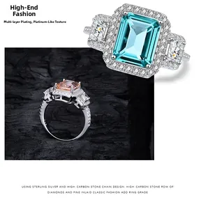 Close-up of emerald-cut blue and champagne high-carbon stone rings in 925 silver