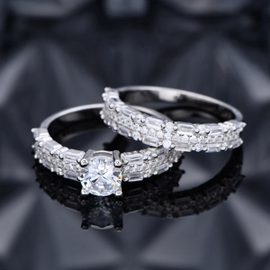 Elegant 925 sterling silver bridal ring set with round main stone and pavé accents