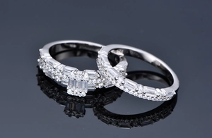 Macro shot of S925 sterling silver bridal set with baguette and round cut stones