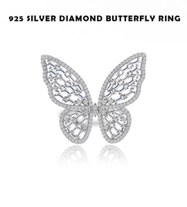 Close-up of 925 sterling silver butterfly ring with hollow design and diamond accents