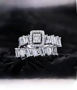 Macro view of micro-pave setting with baguette-cut cubic zirconia on S925 silver rings