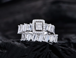 Macro detail of S925 silver wedding ring set with rectangular and baguette cut zircons