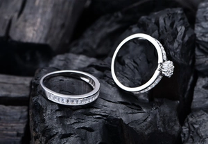 Macro detail of S925 silver ring set with baguette cubic zirconia on charcoal background