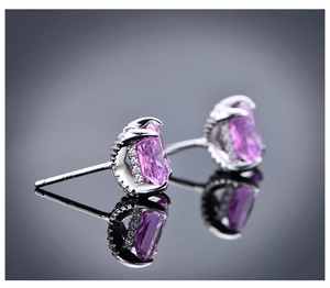 Close-up of S925 sterling silver earrings with square pink gems and side zircon accents
