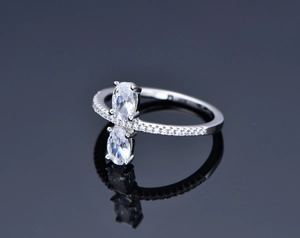 Detailed view of 925 silver double oval cut stones ring with pave set sparkling accents