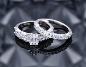 Macro shot of S925 sterling silver ring set with micro-pave crystals on dark background