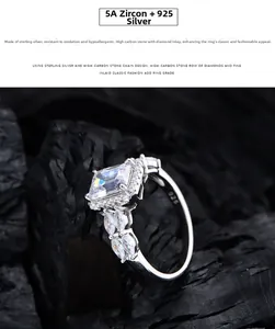 Macro shot of 925 silver ring featuring emerald cut white zircon with marquise accents