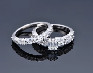 Detailed macro view of S925 sterling silver stamp on micro-paved stacking rings set