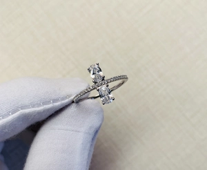 Close-up of double oval stones 925 silver ring with micro-pave band setting