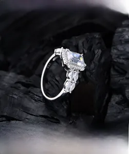 Macro view showing 925 sterling silver hallmark and emerald cut stone craftsmanship