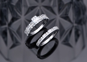 Detailed close-up of S925 silver rings with baguette and pavé set cubic zirconia diamonds