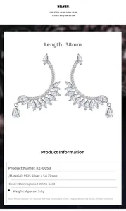 Macro detail of S925 silver feather earrings with 5A zircons and white gold plating
