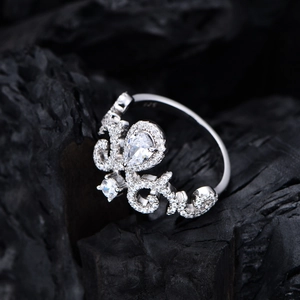 Elegant S925 sterling silver crown ring featuring micro-pave diamonds and pear-cut center stone