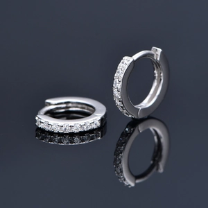 Elegant sterling silver huggie hoop earrings with row of sparkling round zircons