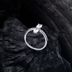 Elegant 925 silver ring featuring double oval-cut main stones and pavé set diamonds