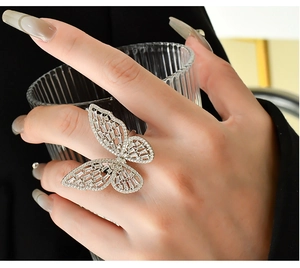 Exquisite sterling silver butterfly ring with intricate hollow wings and zircon inlays