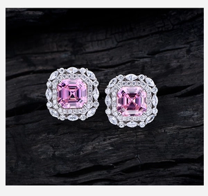 Macro detail of Asscher cut pink diamond earrings set in 925 sterling silver luxury halo